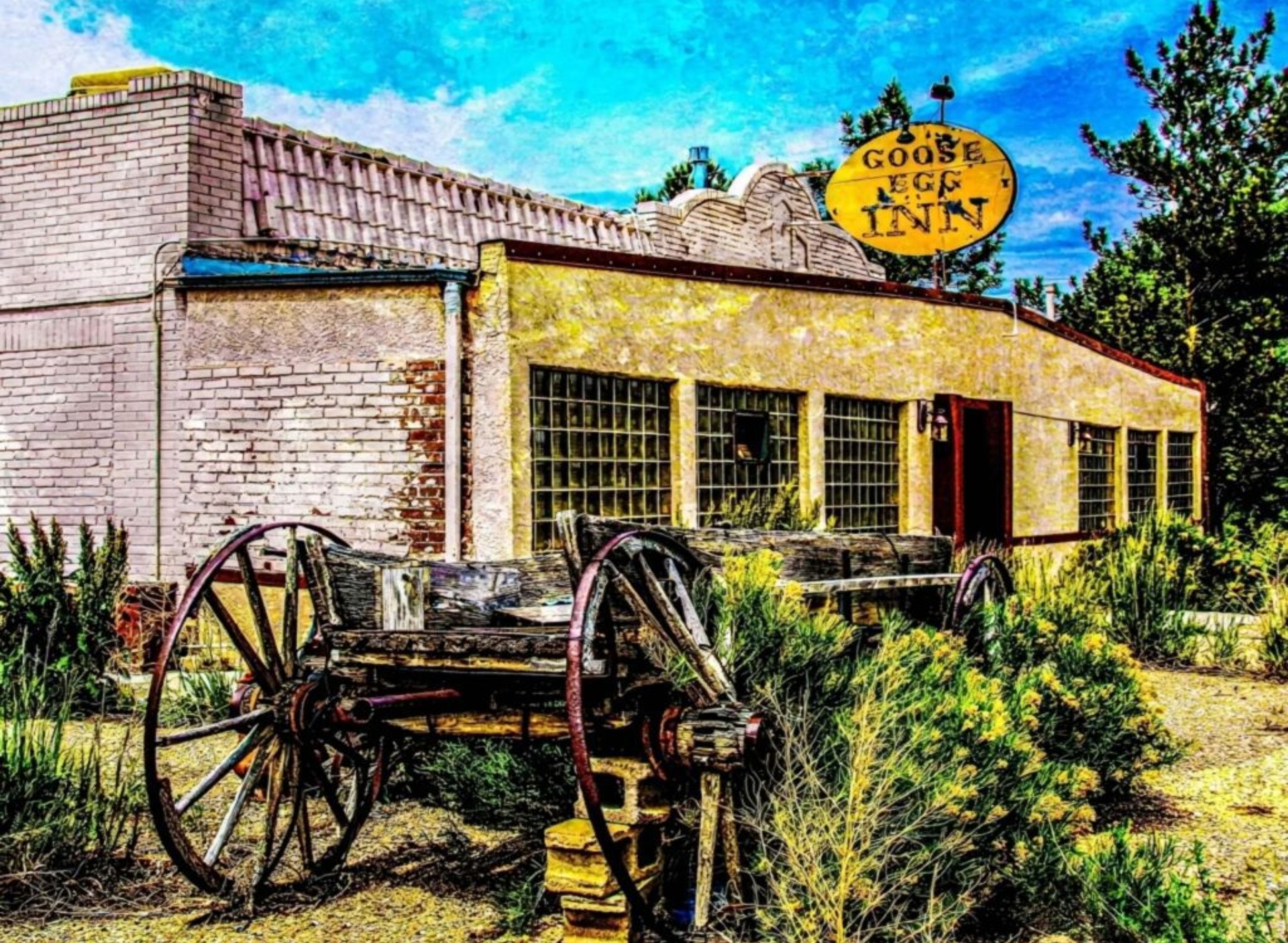 Rustic Goose Egg Inn with antique wagon